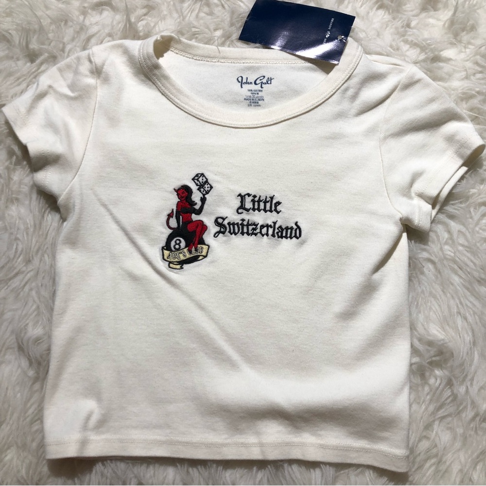 Brandy Melville brand new top. Rare design. Embroidered. One size summer spring